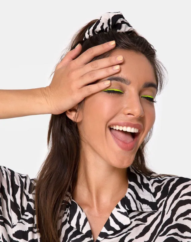 Scrunchie in 90's zebra sold by Motel Rocks