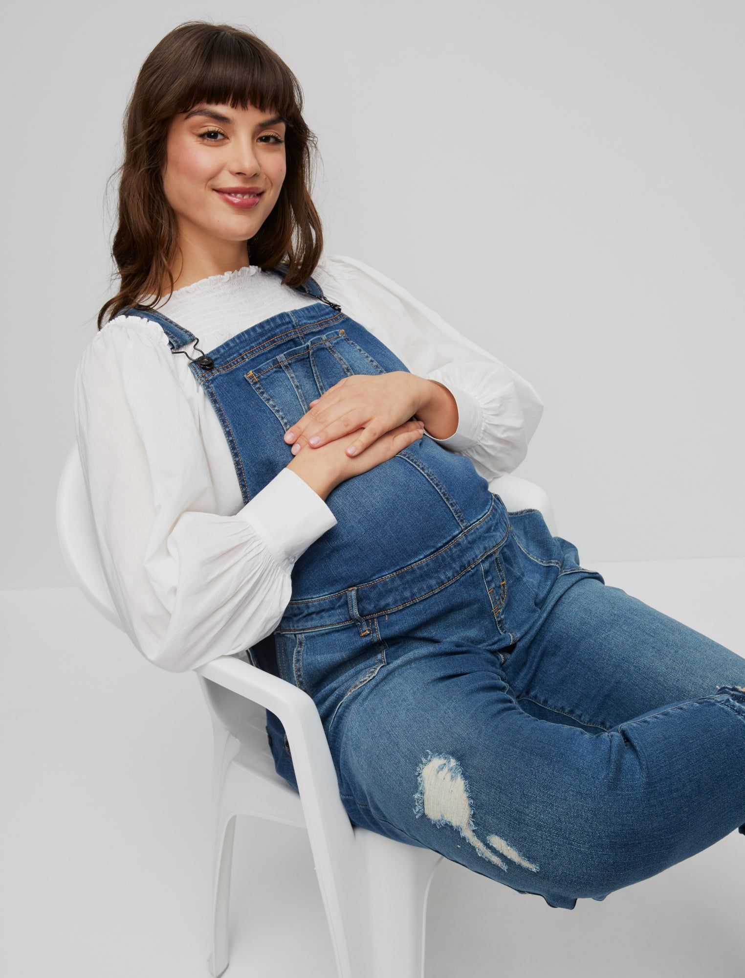 Side Panel Letdown Hem Maternity Overalls sold by Motherhood Maternity