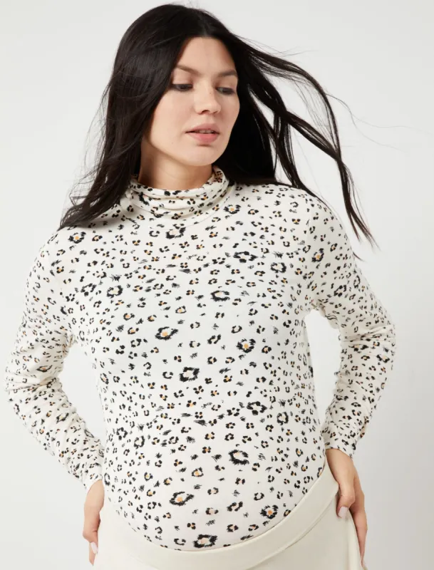 Long Sleeve Turtleneck Maternity Top sold by Motherhood Maternity