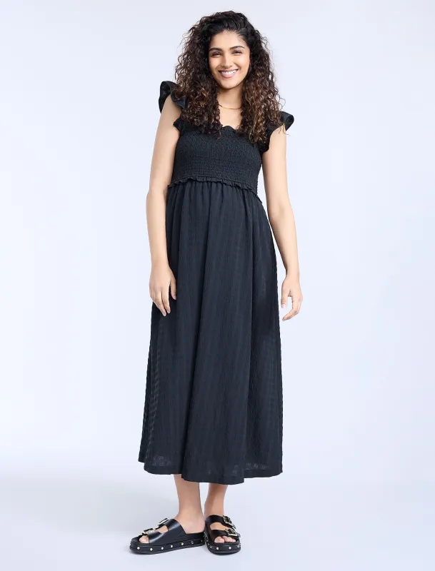 Sleeveless Ruffle Shoulder Smocked Dress sold by Motherhood Maternity