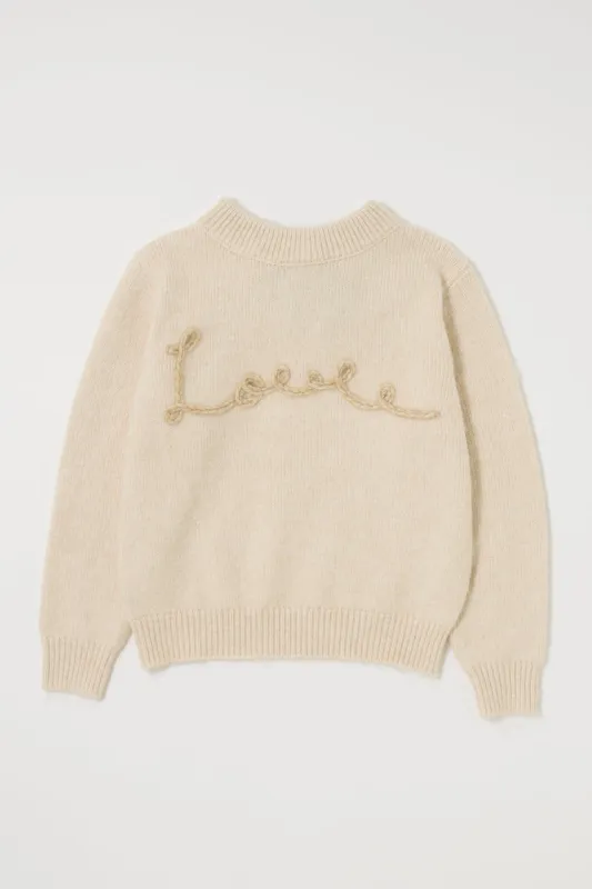 BACK RIBBON SWEATER made by Moussy