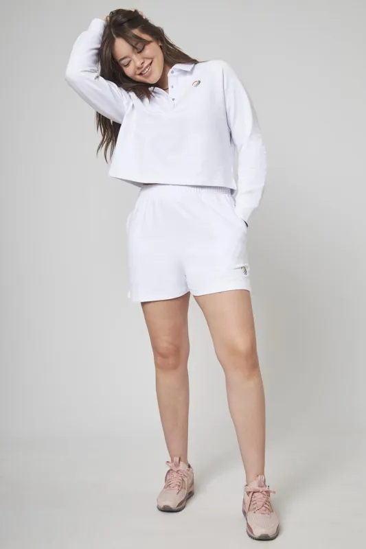 Unwind Polo Front Snap Long Sleeve Polo sold by MPG