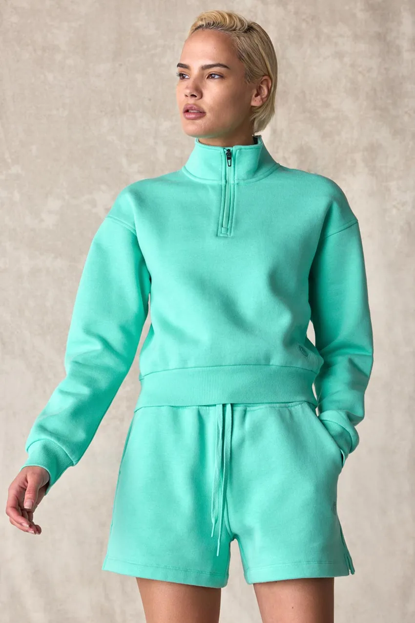 The Comfort Women’s 1/4 Zip Cropped Sweatshirt sold by MPG