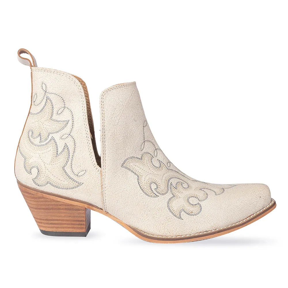 La Ponderosa Booties in Ivory Suede sold by Myra Bag