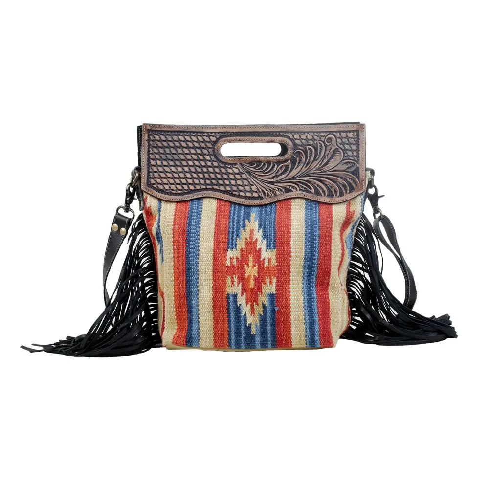 IMPACTFUL HAND TOOLED BAG sold by Myra Bag