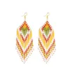 Rain Dance Beaded Earrings In Corn Yellow sold by Myra Bag