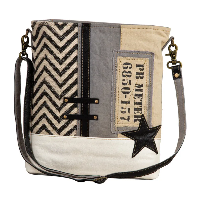 Globetrotter Patch Shoulder Bag sold by Myra Bag