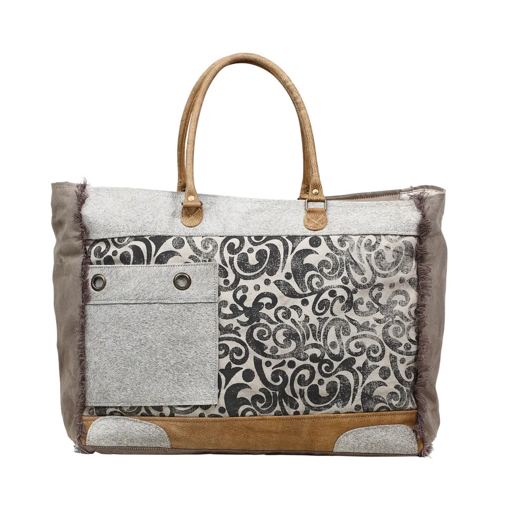 Hide & Floral Print Weekender Bag sold by Myra Bag