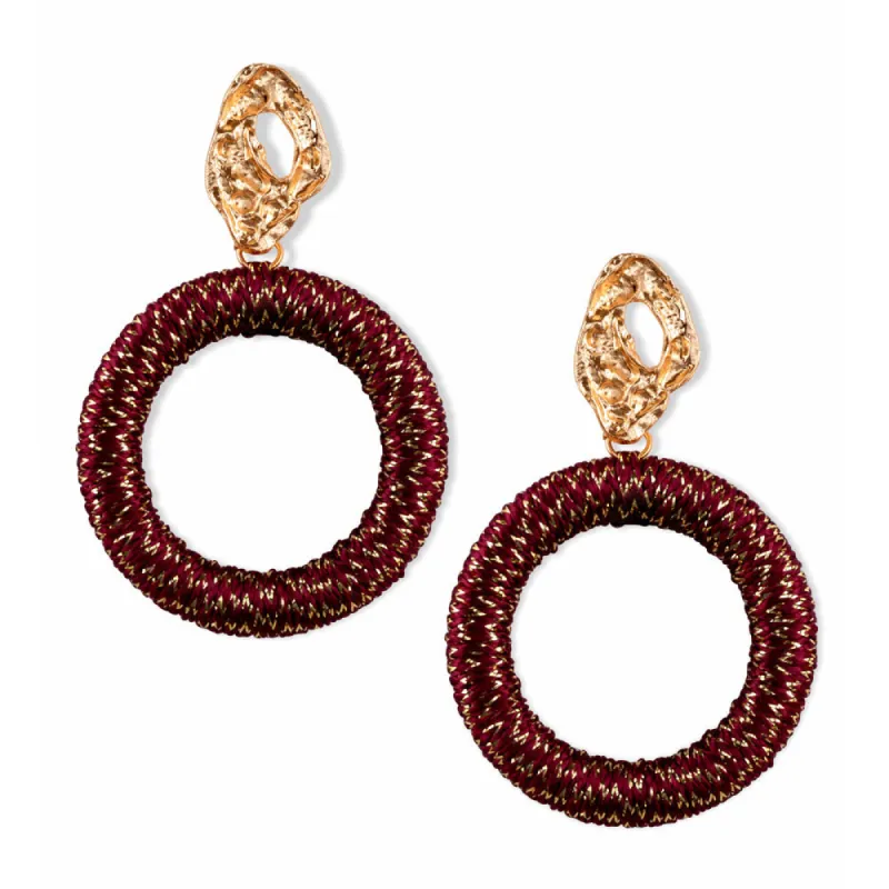 Hammered Blossom Hoops sold by Myra Bag