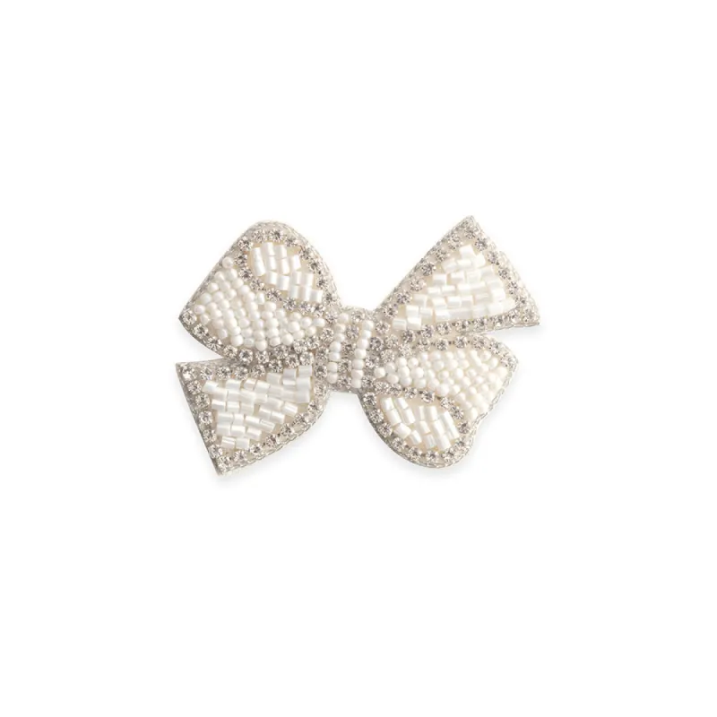 White Glittering Bow Brooch In White sold by Myra Bag