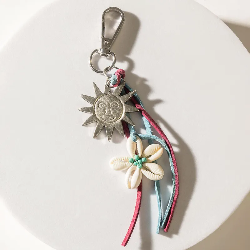 Dawnflower Charm Keychain in Crimson Silver sold by Myra Bag