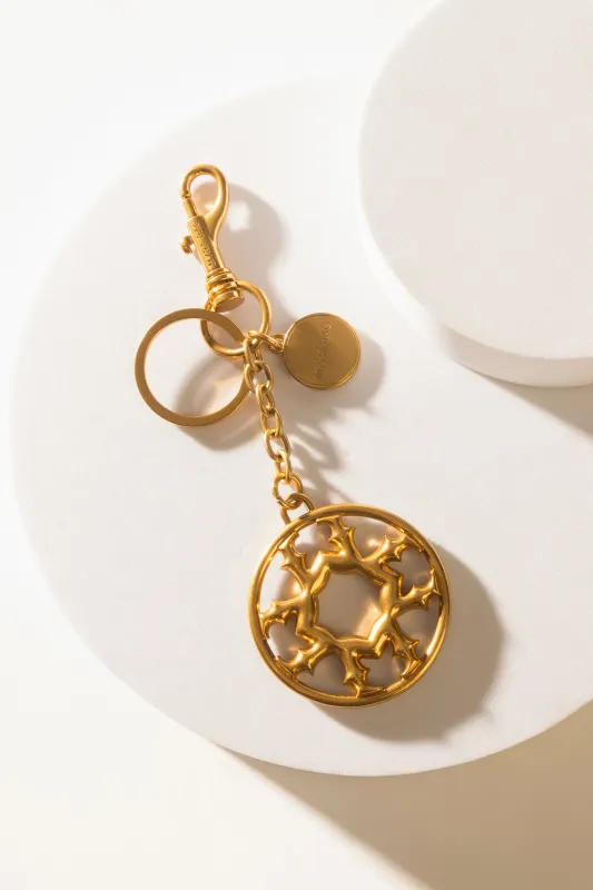 Myra Legacy Loop Charm in Antique Gold sold by Myra Bag