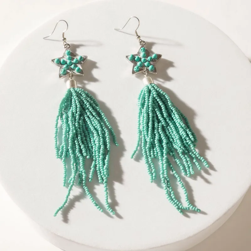 Skyfall Nova Earrings in Turquoise Blaze sold by Myra Bag