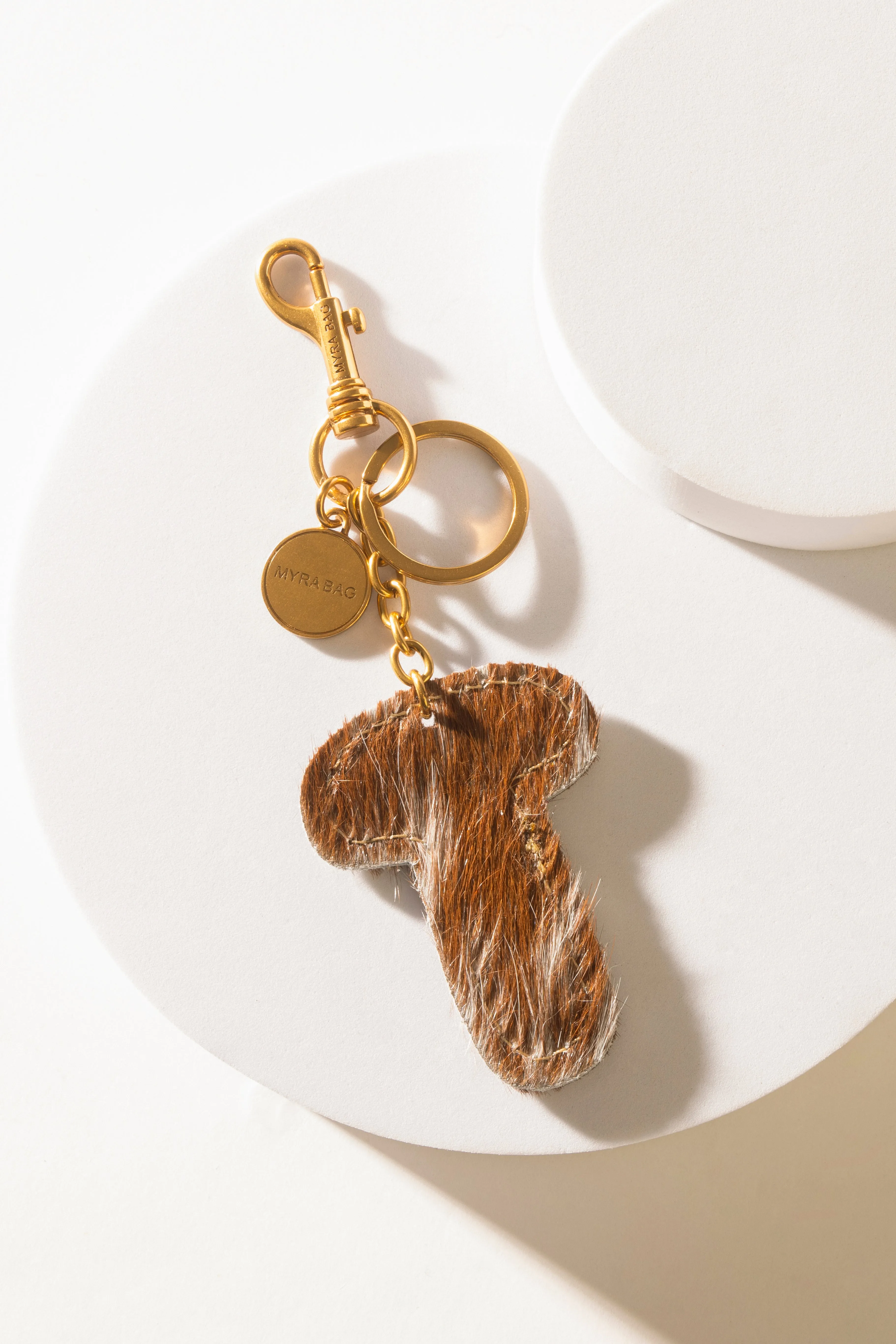 Alpha 'T' Hairon Bag Charm in Brown & White sold by Myra Bag