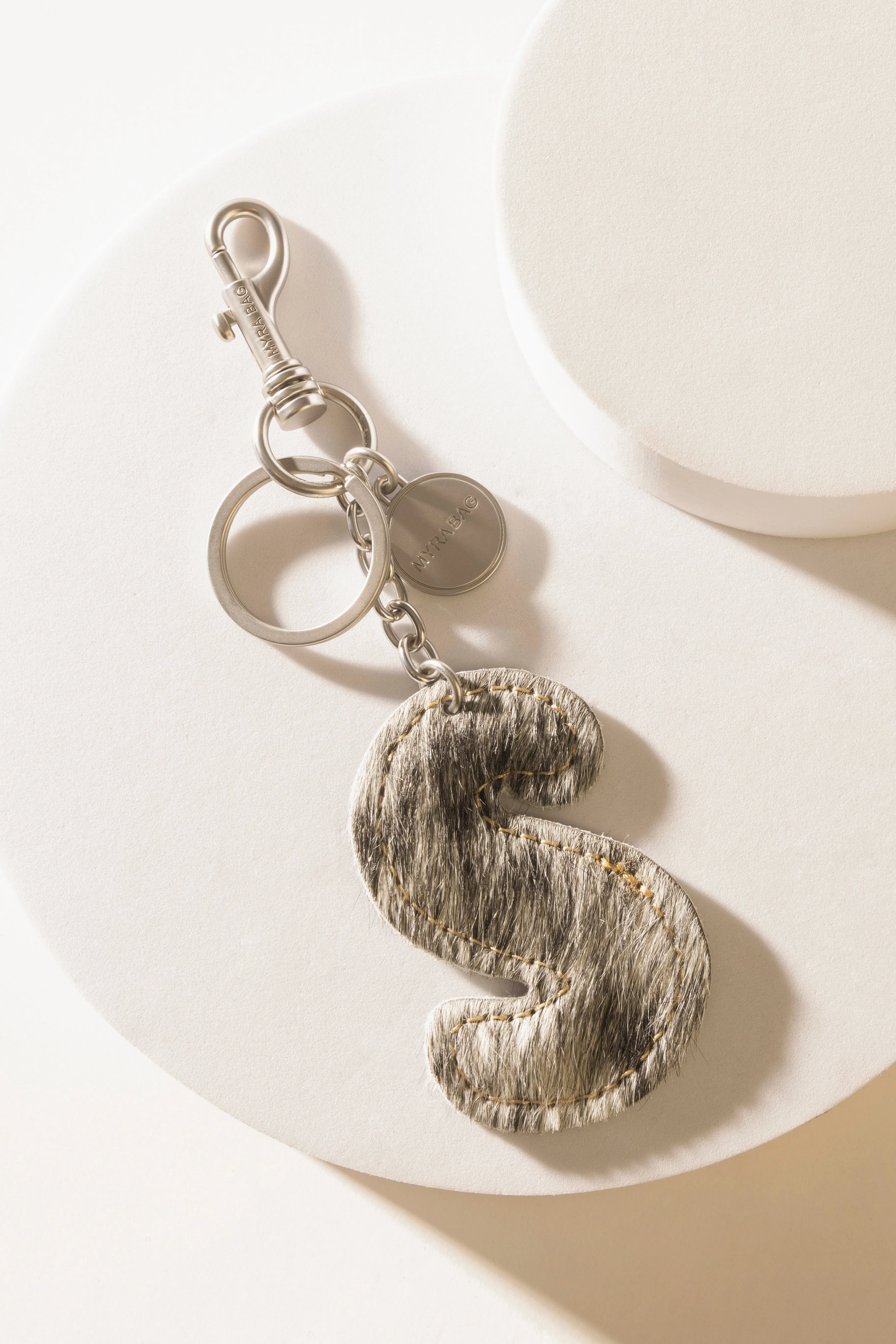 Alpha 'S' Hairon Bag Charm in Vanilla Dust sold by Myra Bag