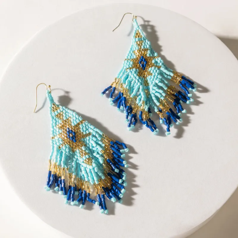 Azul Arrow Earrings in Mirage Cyan sold by Myra Bag
