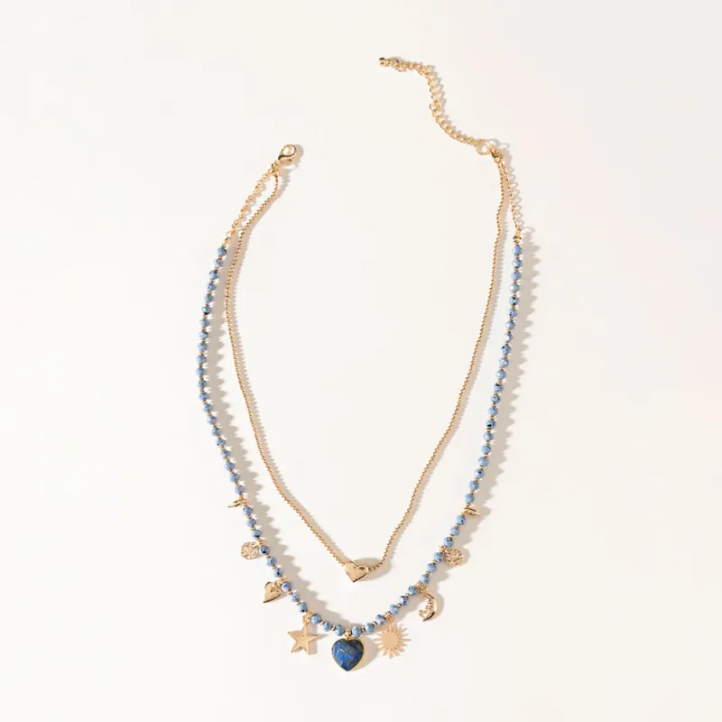 Celeste Charm Necklace in Desert Gold sold by Myra Bag