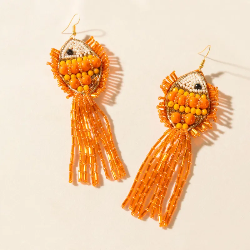 Marina Flame Earrings in Burnt Orange sold by Myra Bag