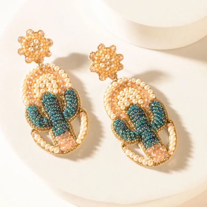 El Paso Glow Earrings in Golden Pearl sold by Myra Bag