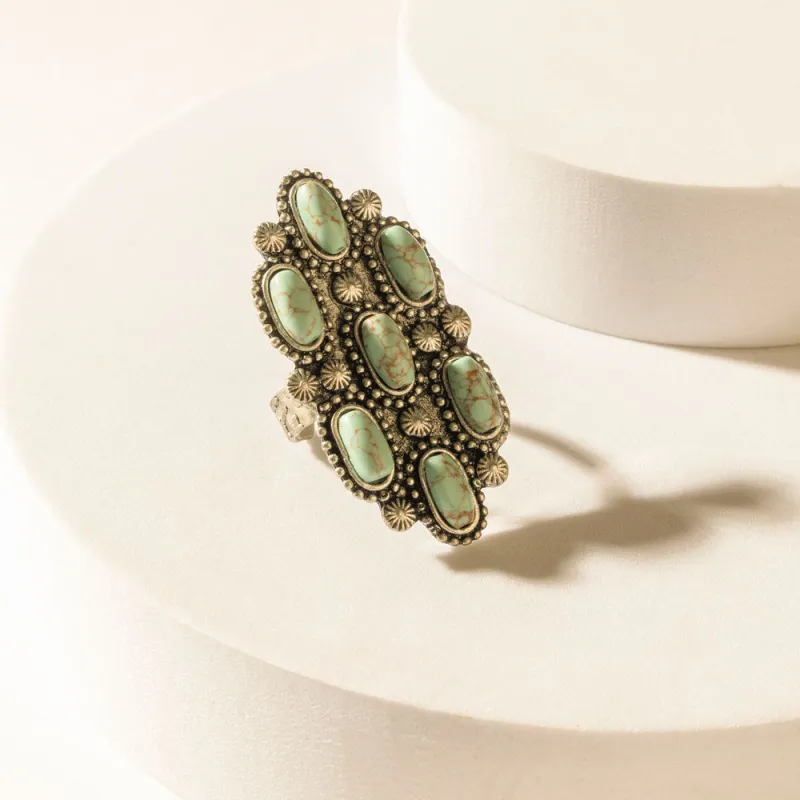 Seven Stones of the West Ring in Canyon Teal sold by Myra Bag