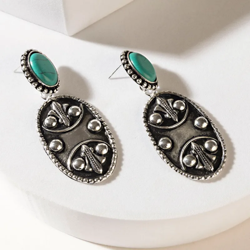 Santa Fe Seals Earrings in Moonlit Silver sold by Myra Bag