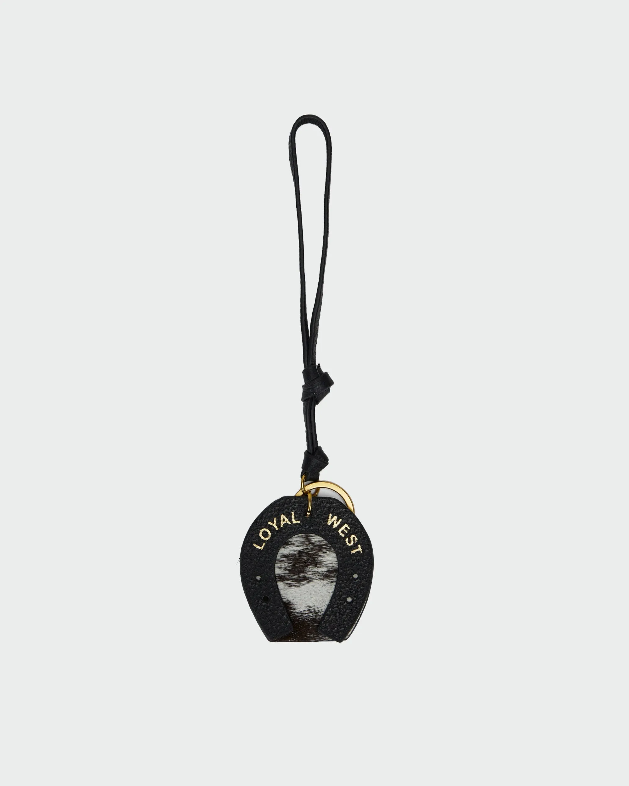 Loyal West Horse Shoe Bag Charm In Black & White Cowhide sold by Myra Bag