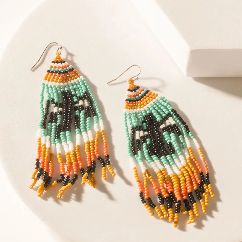 The Eagle Spoke Earrings in Sunny Teal sold by Myra Bag