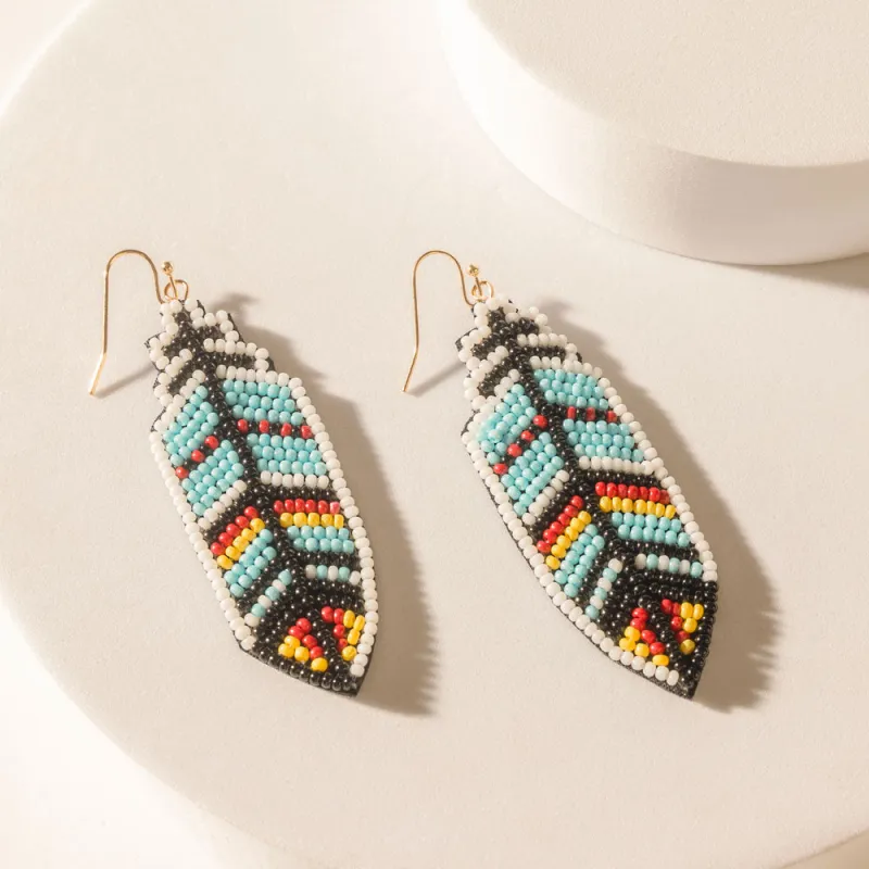 Zuni Feather Earrings in Skyfall Blue sold by Myra Bag