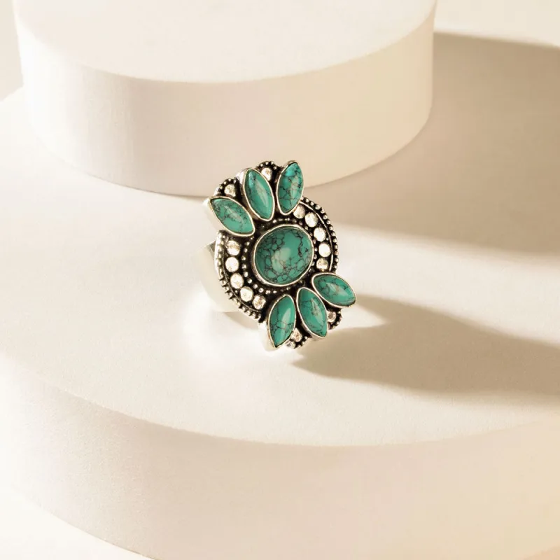 The Wildhalo Ring in Prairie Teal sold by Myra Bag