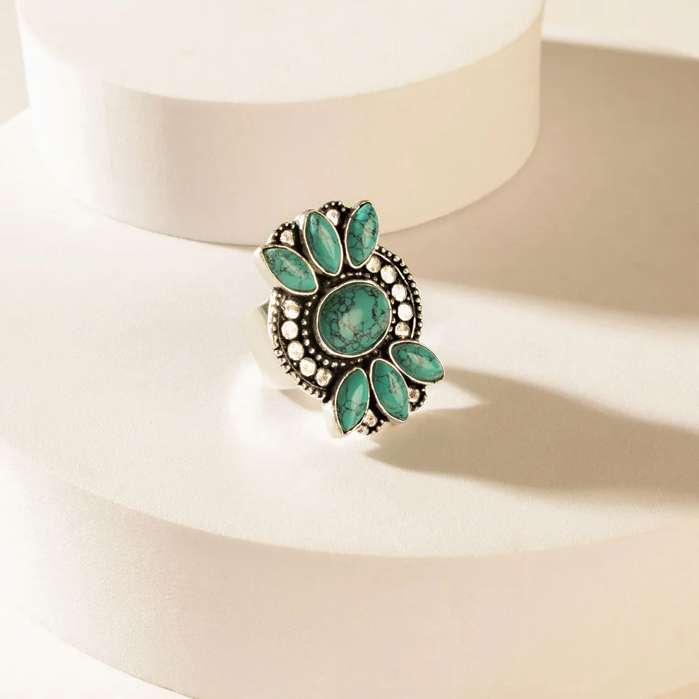 The Wildhalo Ring in Prairie Teal sold by Myra Bag