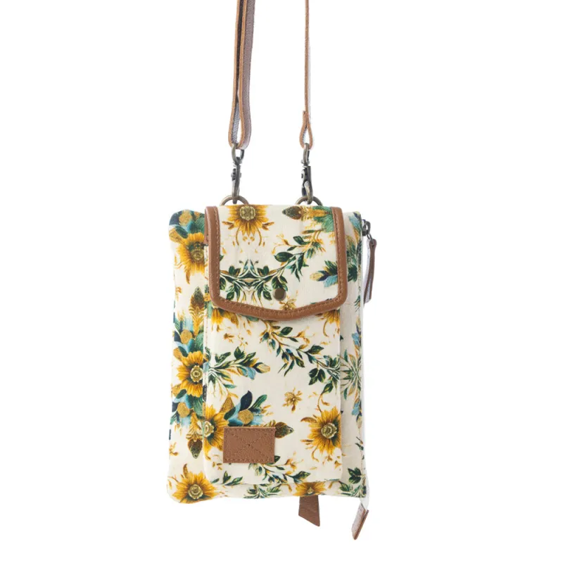 Amber Ray Crossbody Bag with Phone Compartment in Sunlit Ivory sold by Myra Bag