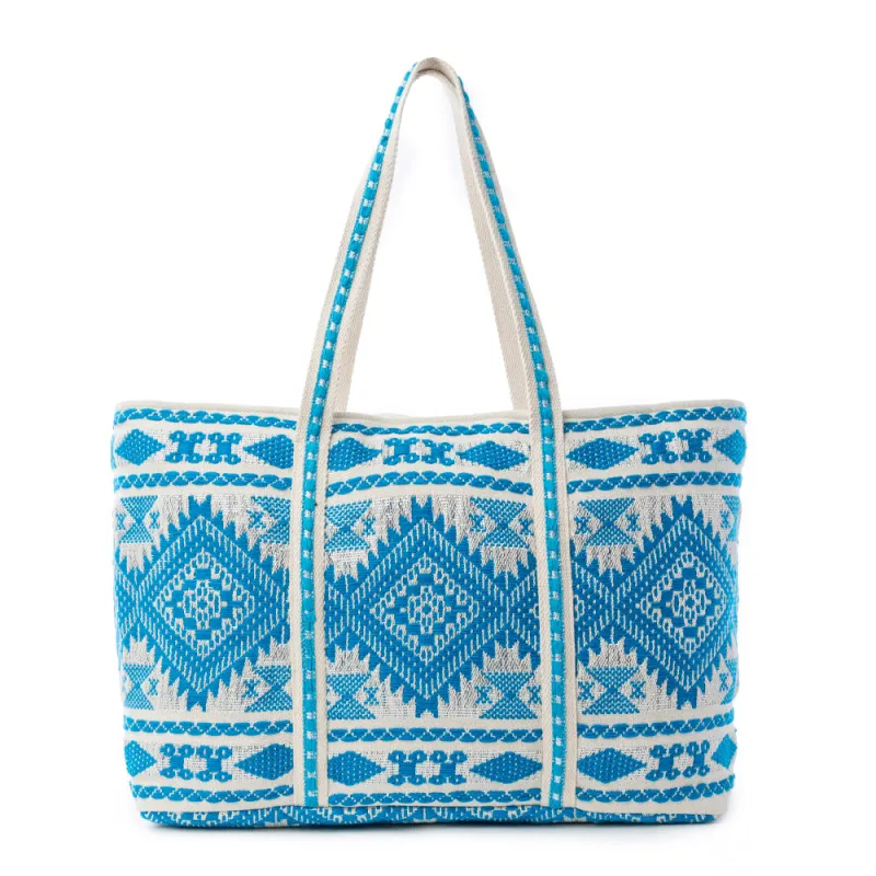 Lagoon Trail Weekender Bag in Ocean Sand sold by Myra Bag