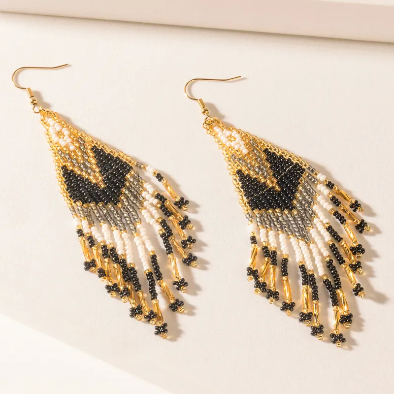 Rodeo Rhythm Earrings in Ivory Amber sold by Myra Bag