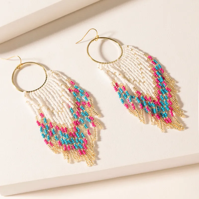 Vaquera Glow Fringe Earrings in Fuchsia Bloom sold by Myra Bag