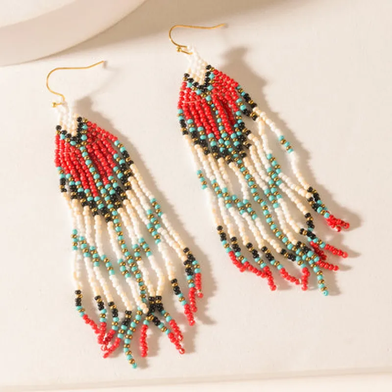 Scarlet Song Fringe Earrings in Desert Ruby sold by Myra Bag
