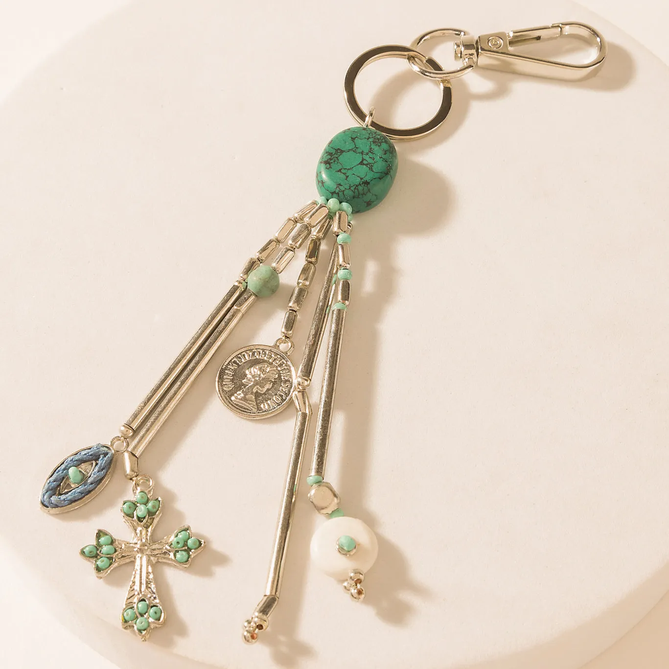 Blue Oval Charm Keychain in Aqua Silver sold by Myra Bag