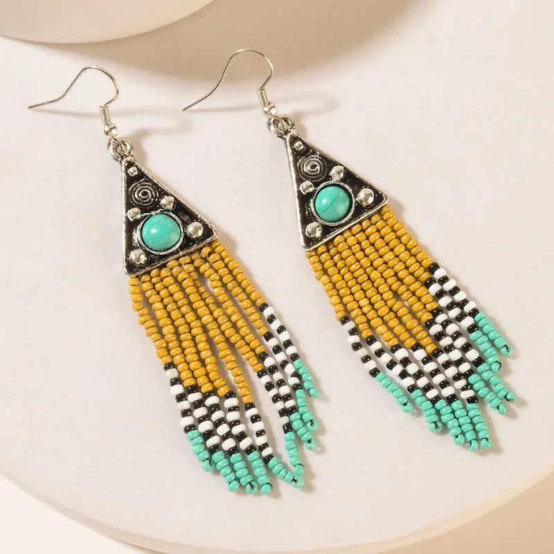 Oasis Bloom Fringe Earrings in Savanna Blue sold by Myra Bag