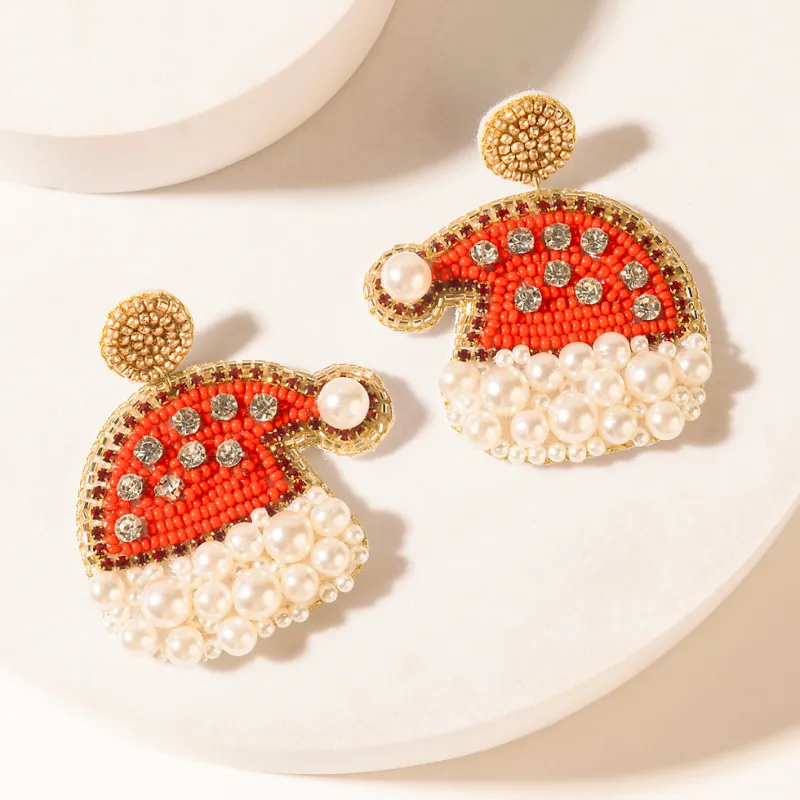 Merry Pearlshine Charm Earrings in Ivory Scarlet sold by Myra Bag