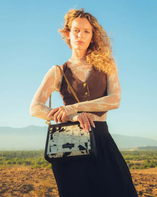 LOYAL WEST SCRAPPY MEDIUM CHAIN BAG IN COWHIDE AND BLACK CALFSKIN sold by Myra Bag