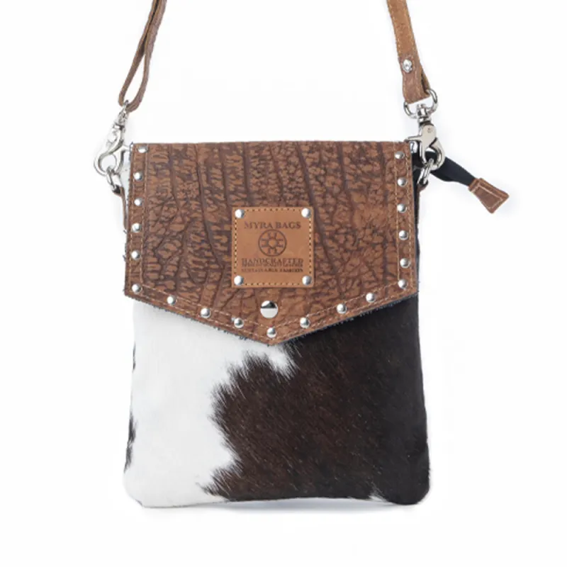 Myra Rustler Bend Canvas & Hairon Bag in Brindle Chestnut sold by Myra Bag