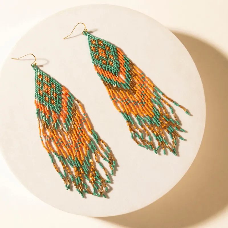 Sundance Ember Beaded Fringe Earrings in Gilded Coral sold by Myra Bag