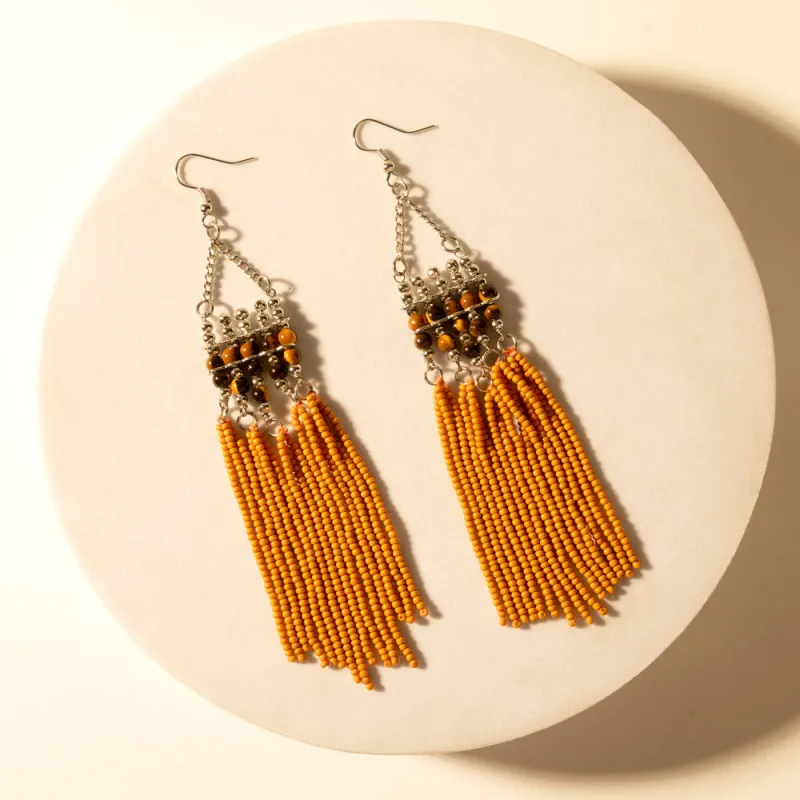 Rustglow Fringe Earrings in Sunbaked Amber made by Myra Bag