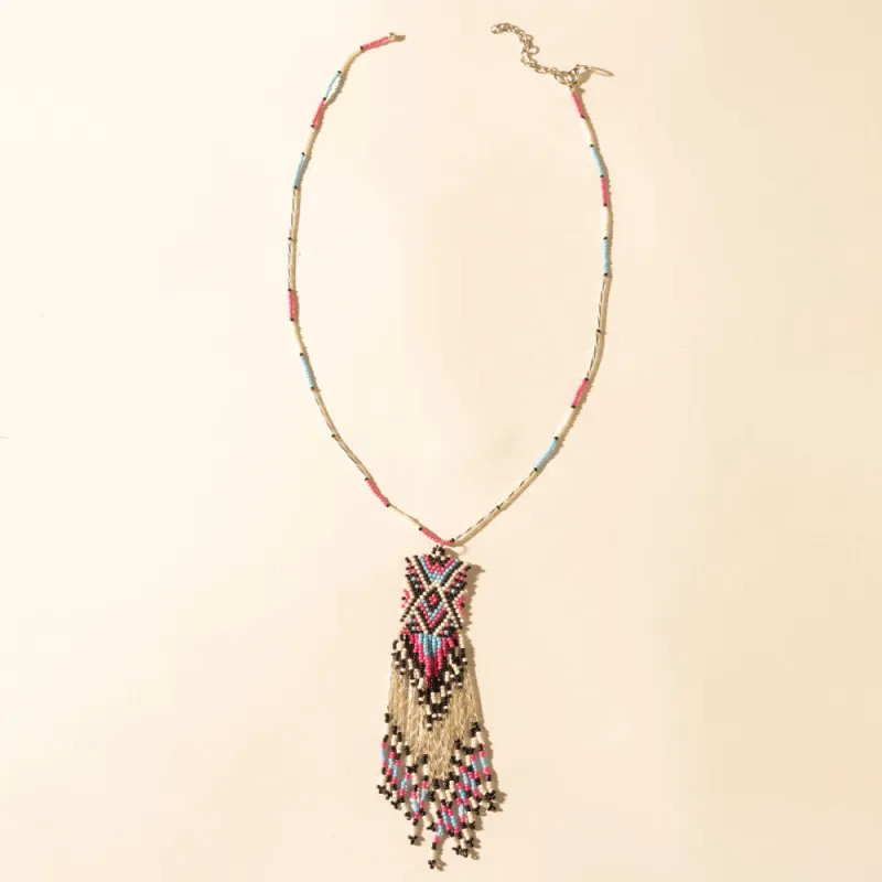 Sky and Coral in necklace in Turquoise made by Myra Bag