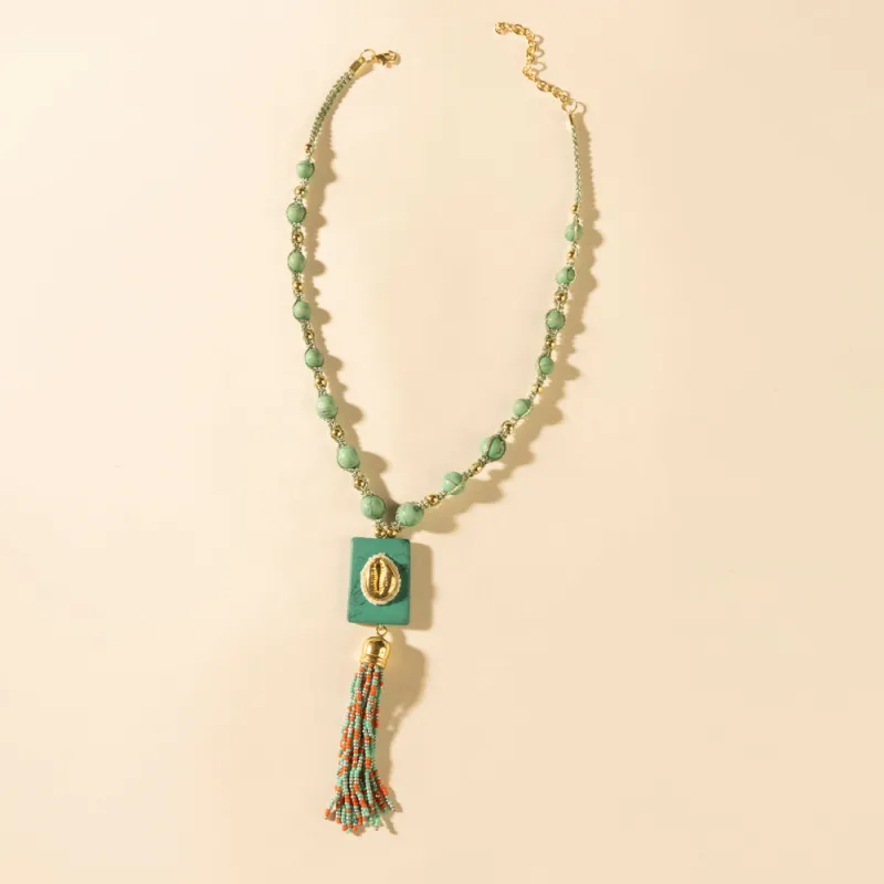 Sun strung beaded necklace in Turquoise made by Myra Bag