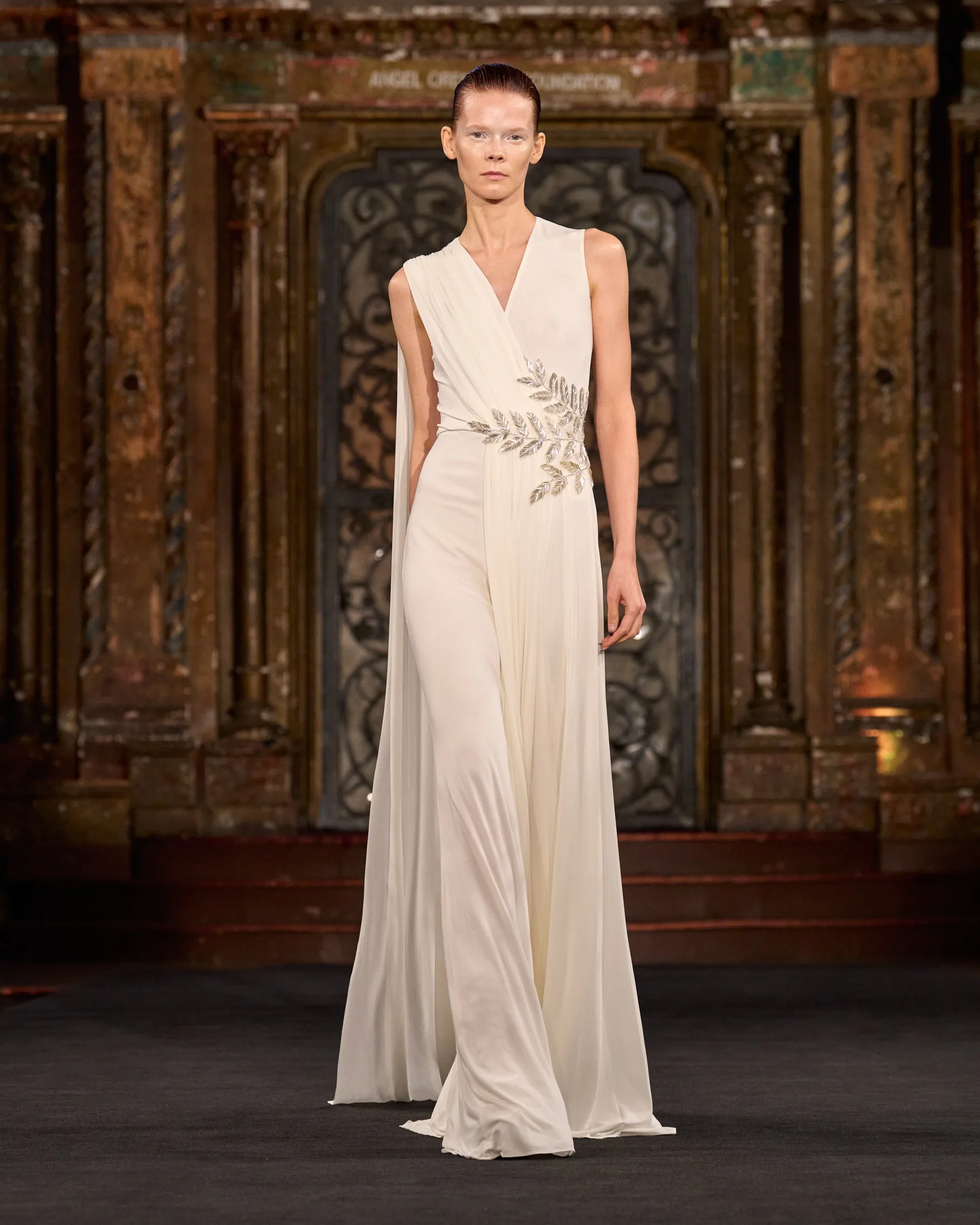 DRAPED V-NECK GOWN WITH EMBELLISHED LEAF DETAIL sold by Naeem Khan