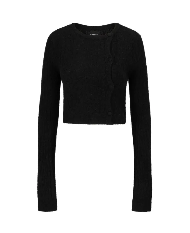 CABLE KNIT WOOL CARDIGAN sold by Nagnata