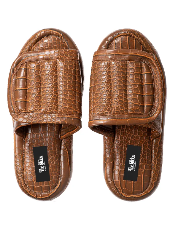The Faux Leather Slides. sold by Natasha Zinko