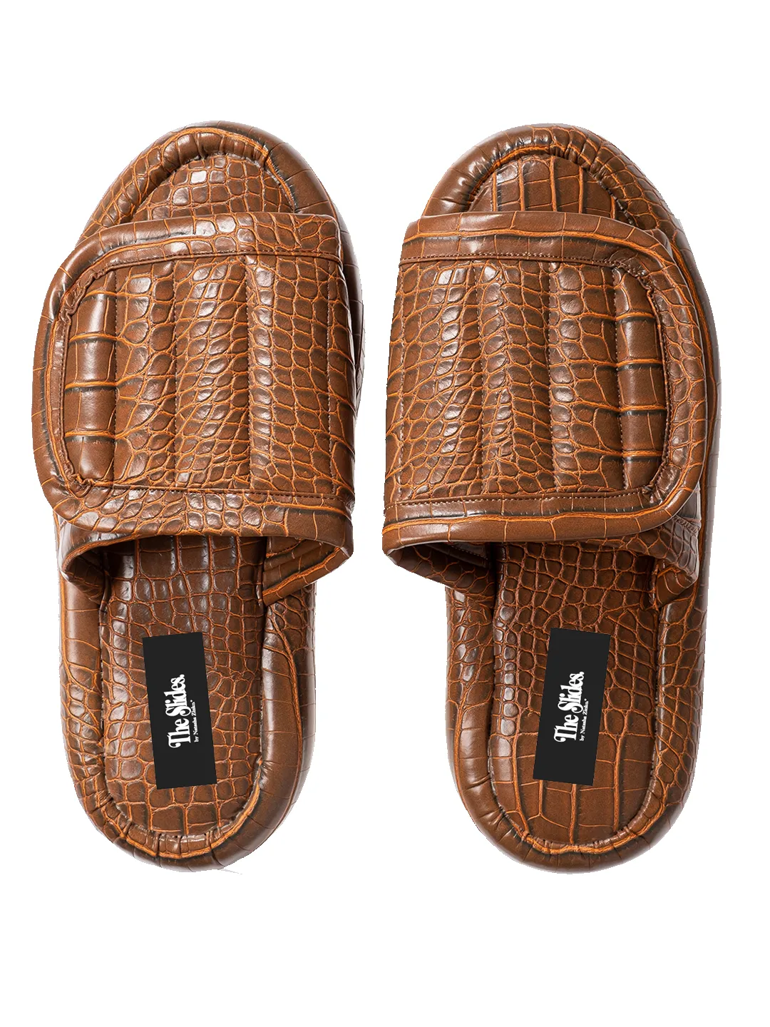 The Faux Leather Slides. sold by Natasha Zinko