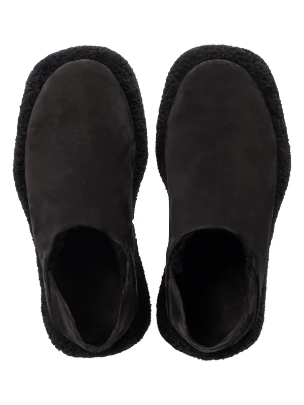 The Shearling Monster Convertible Slides. sold by Natasha Zinko