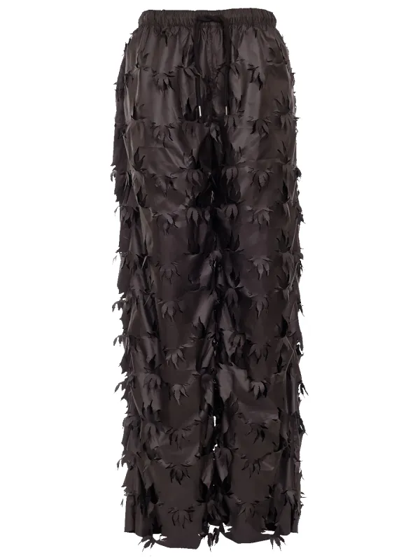 Laser Cut Trousers sold by Natasha Zinko